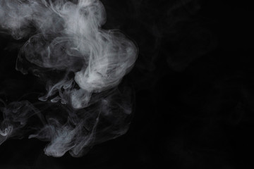 White steam on a black background.