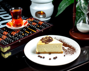 classic cheesecake and black tea in armudu glass