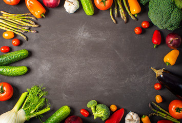 Exposition of fresh organic vegetables on black table. tomato, pepper, broccoli, onion, garlic, cucumber,  eggplant, black Eyed Peas, ecological bag.