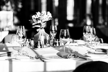 Beautiful table set for an event party or wedding reception . restaurant interior
