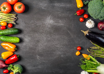 Exposition of fresh organic vegetables on black table. tomato, pepper, broccoli, onion, garlic, cucumber,  eggplant, black Eyed Peas, ecological bag.