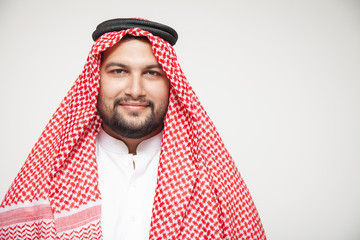 Arab sheikh wearing headscarf portrait isolated on white background