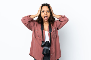 Young photographer woman over isolated white background with surprise expression