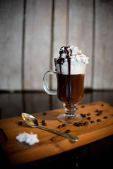 cup of coffee on wooden table
