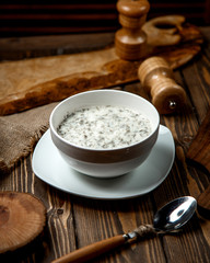 creamy soup dovga filled with herbs