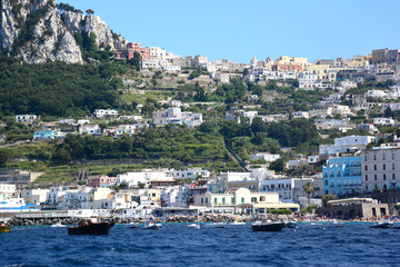 Capri, Italy: Panoramic view from the Marina Grande to the town in the hills up above.