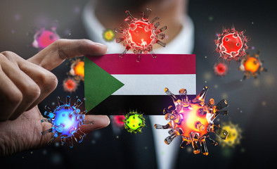 Corona Virus Around Sudan Flag. Concept Pandemic Outbreak in Country