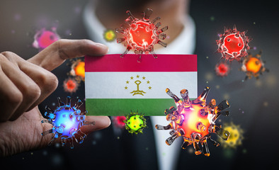 Corona Virus Around Tajikistan Flag. Concept Pandemic Outbreak in Country