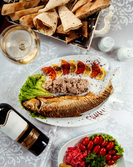 fried fish with pastry and herbs