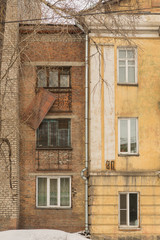 destroyed old Soviet apartment buildings in the city