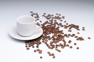 cup of coffee with beans