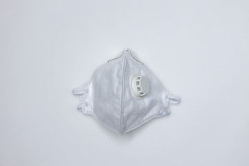 Respirator with valve for personal protection from coronavirus