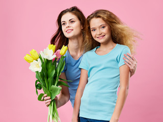 mother and daughter with tulips