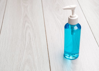 alcohol sanitizer gel hand wash on wood table top view copy spac