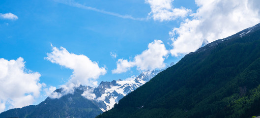 Amazing French Alps, part of famous trek Tour du Mont Blanc. Astonishing view of the Mont Blanc mountain range during the summer. Beautiful glaciers.