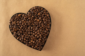 Coffee beans on a black heart