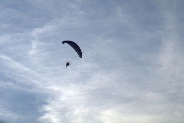 paraglider in the sky,parachute, clouds,flying, fly, paragliding, blue, air, flight,fun,sport, freedom,high, white, wind, nature, adventure, gliding,