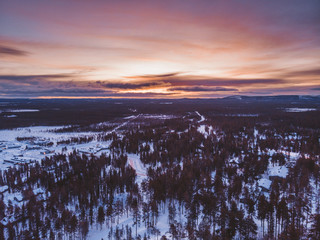 Charming winter sunset in Lapland