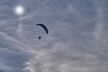 paraglider in the sky,cloud, parachute,flying, fly, freedom, paragliding, flight, nature, air, fun,