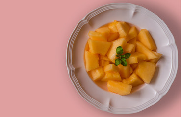 freshly melon ready to eat on a dish.