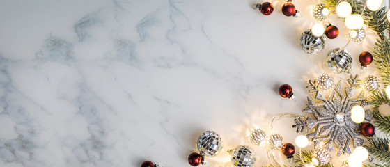 Christmas and New Year holidays composition on white marble background top view. © Guschenkova