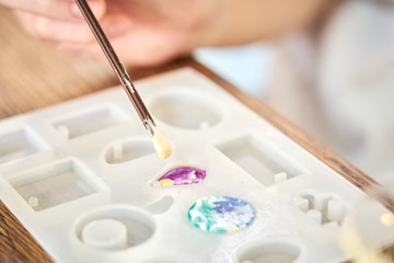 Dropping white color resin to resin mold , process of prepare for make an accessories
