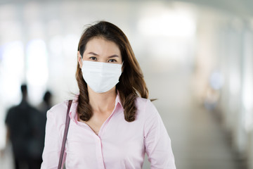 Woman wearing mask in walking.