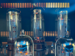 Electronic vacuum tubes close-up. Old electronic Amplifier components.