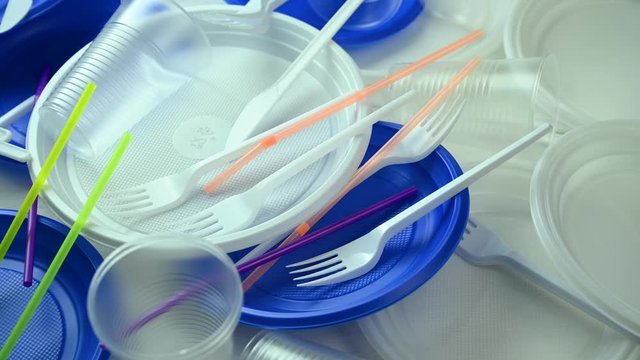 plastic dishes of different colors spinning on table