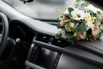 bridal bouquet in  car