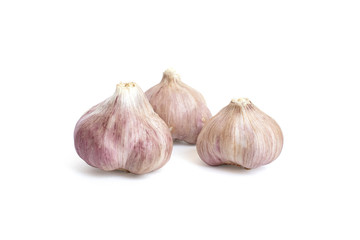 Three garlic heads isolated on white background