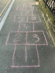 Hopscotch drawn on the pavement in chalk