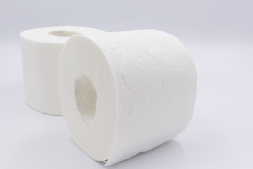 White toilet paper, rolled,  on white, background, copy space.