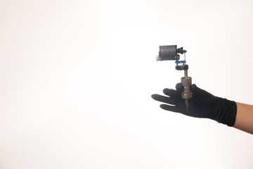Naklejka premium female tattoo machine light background for the site