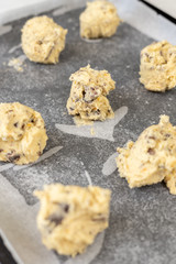 Raw crisp cookies prepared for baking on baking tray