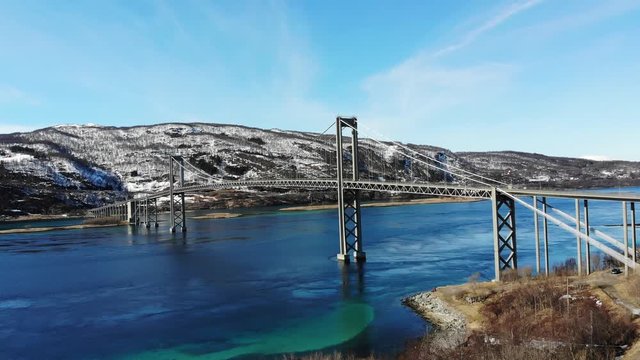 The Tjeldsund Bridge is a suspension road bridge that crosses the Tjeldsundet strait between the mainland and the island of Hinn&oslash;ya in Troms og Finnmark county, Norway.