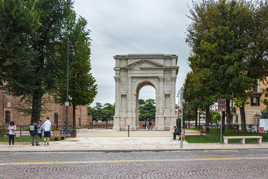 Arco dei Gavi - massive, ancient white-marble arch dismantled by the French and reassembled in 1932 on Piazzetta Castelvecchio in Verona, Italy.
