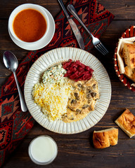 rice with salad and mushroom in sauce