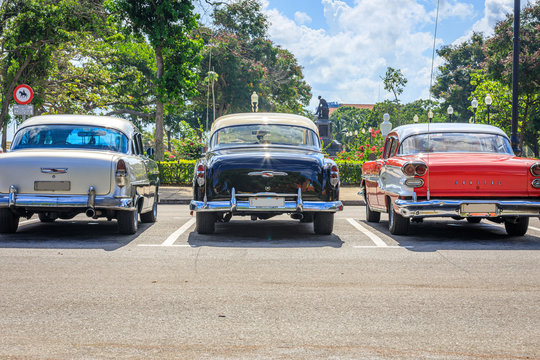 Colorful Group Of Classic Cars In Old Havana, An Iconic Sight In Cuba