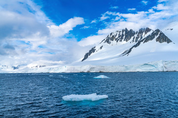 Fototapeta na wymiar Iceberg Snow Mountains Blue Glaciers Dorian Bay Antarctica