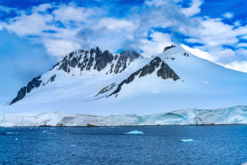 Fototapeta na wymiar Snow Mountains Blue Glaciers Dorian Bay Antarctica