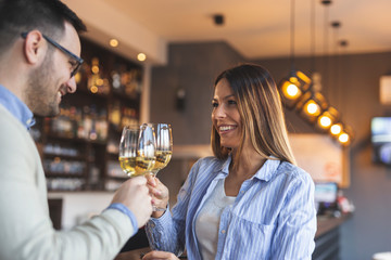 Couple making a toast with wineglasses