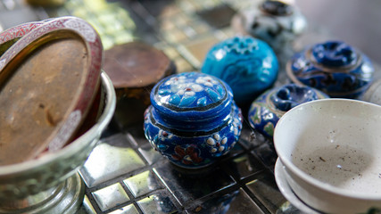 .A collection of vintage asian things. Household items and small vintage statuettes from Asia