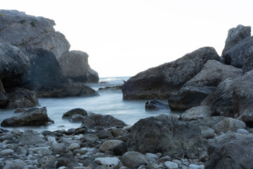 Fototapeta na wymiar Long exposure shot at shores of Capri Island in Italy