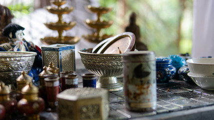 .A collection of vintage asian things. Household items and small vintage statuettes from Asia