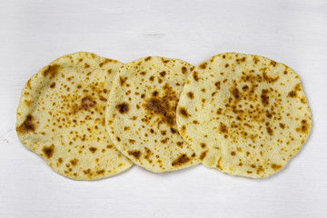 pita breads on a white background