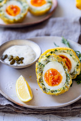 Scotch eggs wrapped with smoked haddock and cod