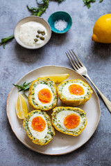 Scotch eggs wrapped with smoked haddock and cod