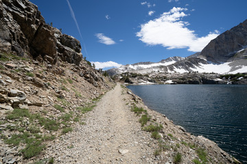 Trail through Steelhead Lake in 20 Lakes Basin hiking area in the Eastern Sierra Nevada Mountains of California