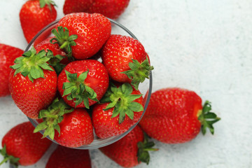 A bowl with ripe bright strawberry